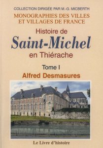 Couverture du livre « Histoire de Saint-Michel en Thiérache – Tome 1 » d’Alfred Desmasures. La page présente le titre sur fond beige et une photographie de l’ancienne abbaye de Saint-Michel, avec ses bâtiments en briques et pierre au bord de l’eau.